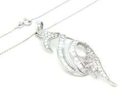 18kt White gold cubic zirconia bagutte with round swirl necklace
