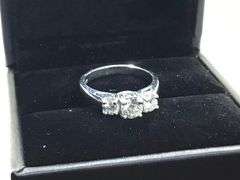 DAZZLING PLATINUM TRILOGY ENGAGEMENT RING