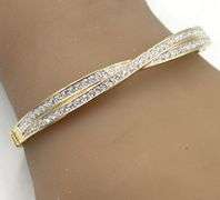 Swarovski gold tone crystal bangle bracelet