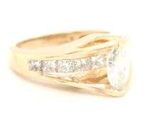 14kt Yellow gold 1.72ctw diamond ring with a tapered shank