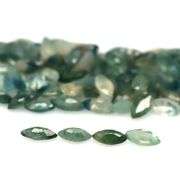 Stunning blue green 9.45ct marquise cut Sapphire set