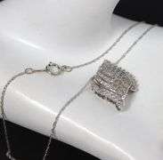 10kt White gold diamond cluster swirl pendant on chain