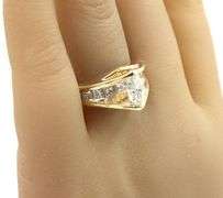 14kt Yellow gold 1.72ctw diamond ring with a tapered shank