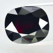 Exceptionally cut 12.84ct Midnight crimson Tanzanian Garnet