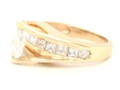 14kt Yellow gold 1.72ctw diamond ring with a tapered shank