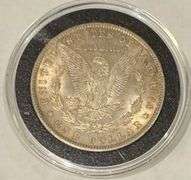 1884 O BU Morgan Dollar Toned