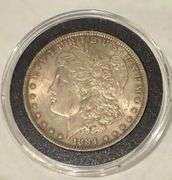 1884 O BU Morgan Dollar Toned