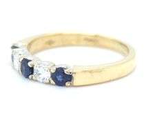 18kt Yellow gold diamond and blue sapphire band