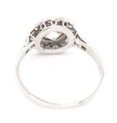 Platinum 0.50ctw European cut halo diamond ring