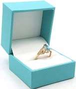 Charming Yellow Gold oval Blue Topaz Ring