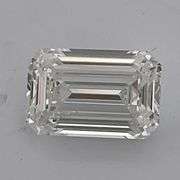 AMAZING IGI CERTIFIED LOOSE LAB DIAMOND 7.02 CARATS EMERALD CUT F-VS1