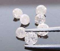 Sparkling .43ct set of round brilliant Diamonds!