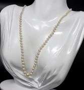 Vintage graduated pearl strand necklace with diamond clasp and shortener