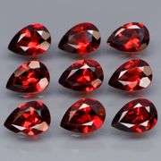 Premium 7.12ct pear cut cherry red Garnet set
