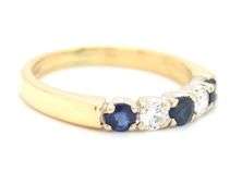 18kt Yellow gold diamond and blue sapphire band