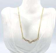 14kt two tone gold 0.85ctw RBC and baguette chevron necklace