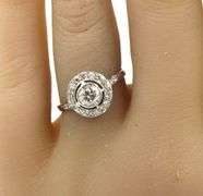 Platinum 0.50ctw European cut halo diamond ring