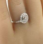 Platinum 0.50ctw European cut halo diamond ring