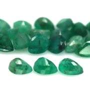 Rich green unheated 9.45ct Zambian Emerald set