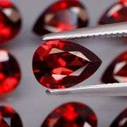 Premium 7.12ct pear cut cherry red Garnet set