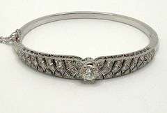 Fantastic diamond  bangle in 14k white gold , size 2.5 x2.0 inch