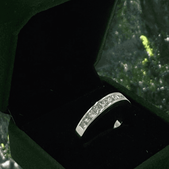 Dazzling White Gold Princess Cut Channel Set Diamond Band