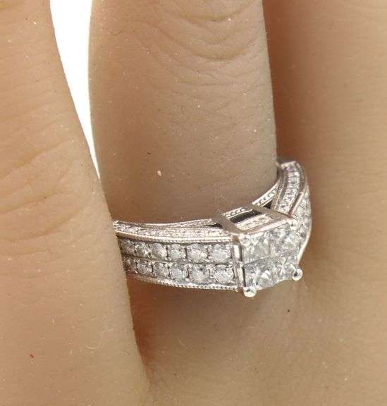14kt White gold 1ctw Invisible set diamond ring