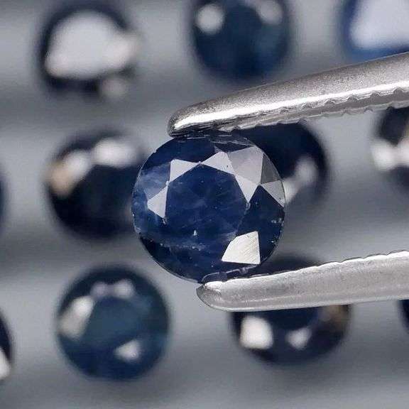 Heated Only! 4.47ct dark blue Sapphire set