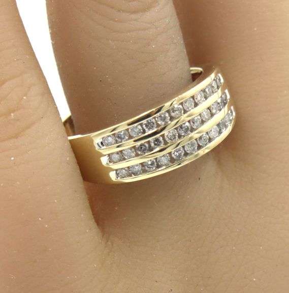 10kt Yellow gold 0.65ctw channel set 3 row diamond band
