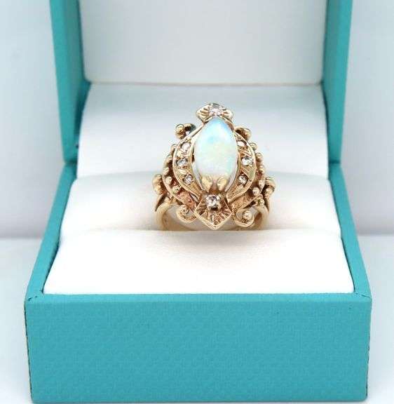 Vintage style opal and diamond ring in 10kt