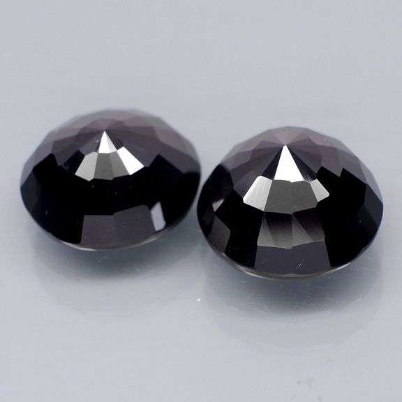 Matched 12.5mm pair of all black Tektite weighing 20.02 carats!