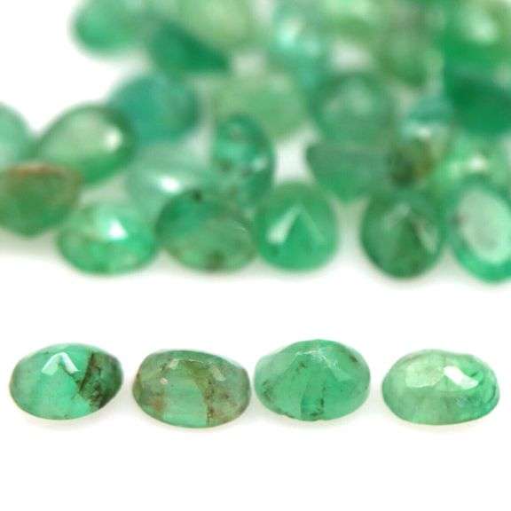 Rich emerald green 7.49ct 35pc Emerald set