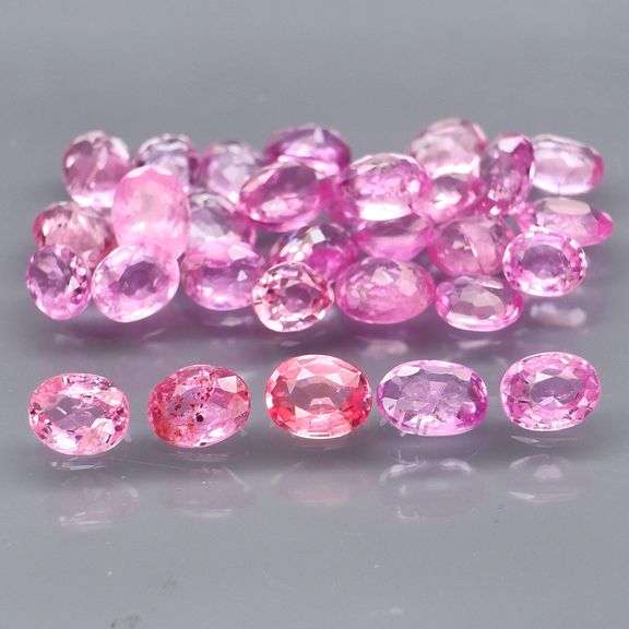 Heated only! Vibrant 4.97ct bubble gum pink Sapphire set
