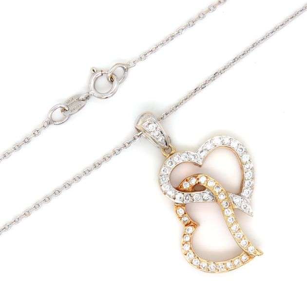 18kt two tone gold heart shaped diamond pendant on chain