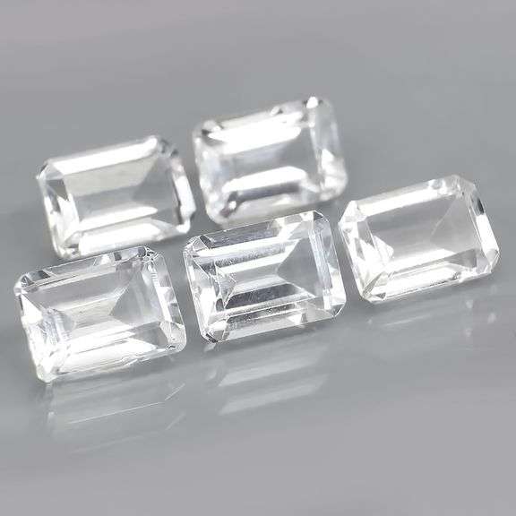 Superb 6.48ct clear white Topaz set