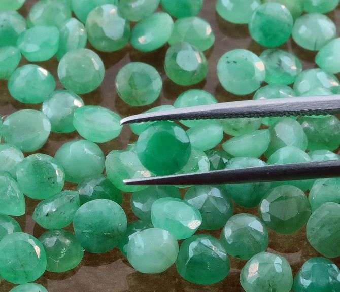 Huge! 31.10ct set of round cut Zambian Emeralds!