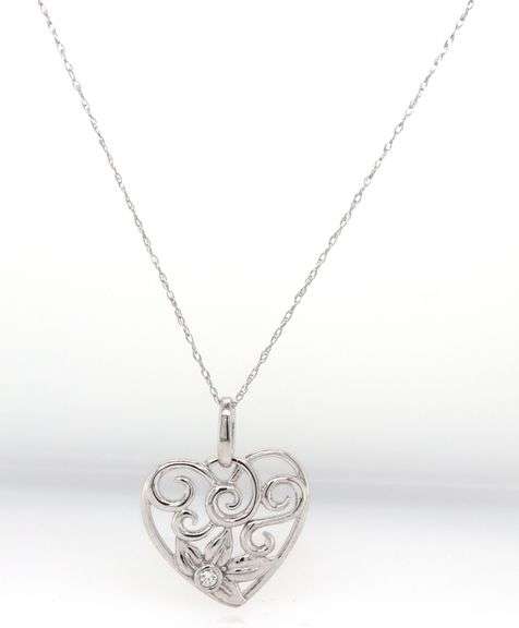 14kt White gold diamond swirl heart pendant on chain