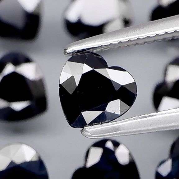 Heated Only! 6.17ct midnight blue Sapphire set