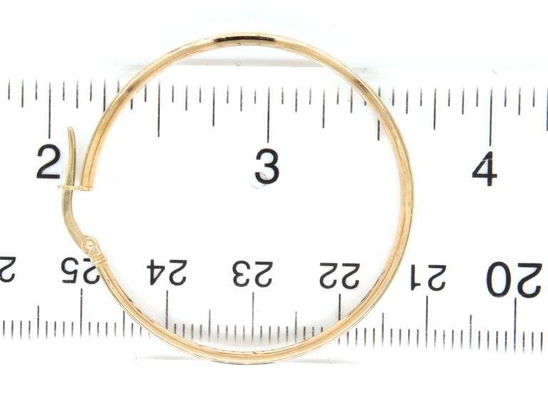 14kt Yellow gold Flat hoop with edge