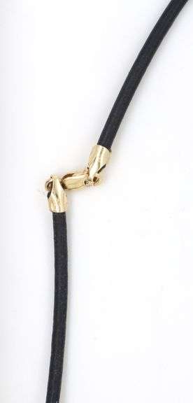 18kt Yellow gold Zodiac Aquaros diamond pendant on black cord necklace