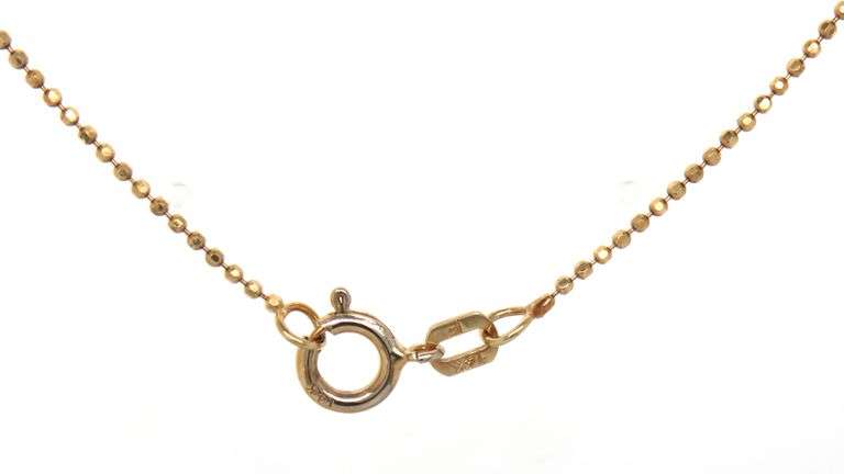 14kt Yellow gold pear shaped topaz and round peridot station necklace