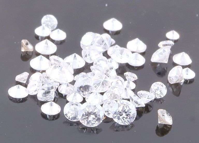 Bright white and full of fire! .86ct set of real Diamonds!