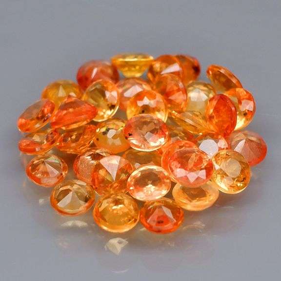 Full fire! 4.85ct top orange Sapphire set