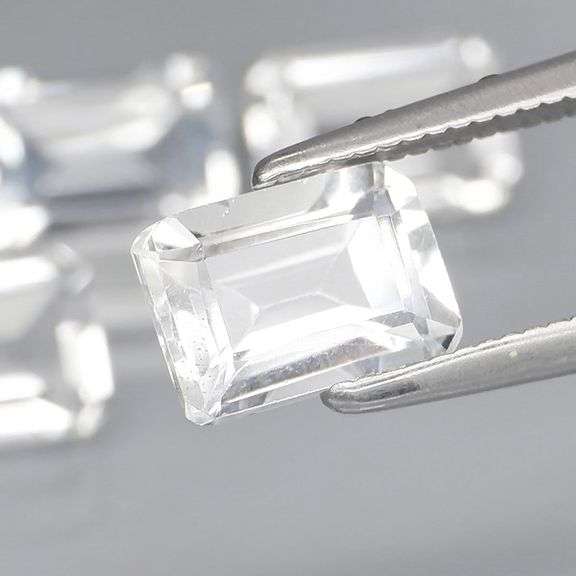 Superb 6.48ct clear white Topaz set