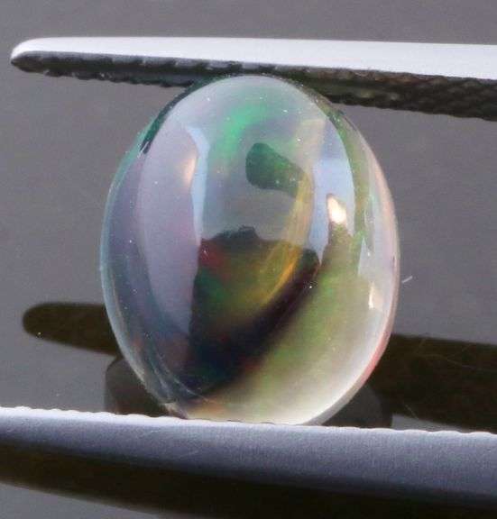 Exotic 1.95ct bi-color Ethiopian Black Opal cabochon