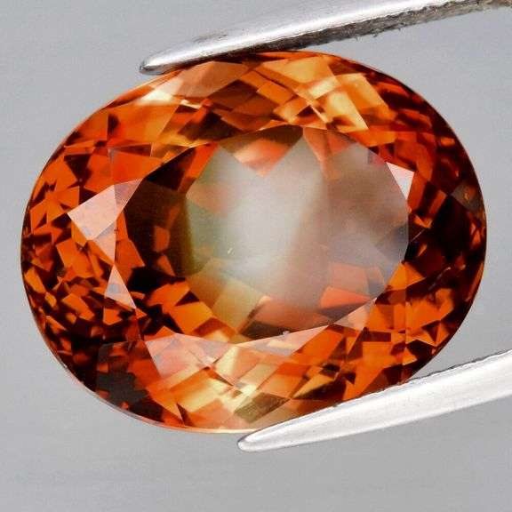 Exquisite 20.63ct VVS bi-color whiskey red Imperial Topaz