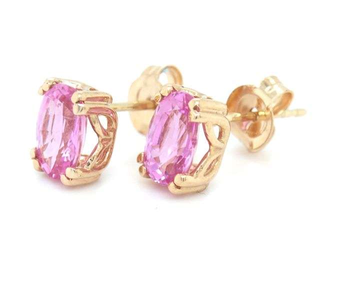 14kt Yellow gold 1.30ctw oval pink sapphire stud earrings