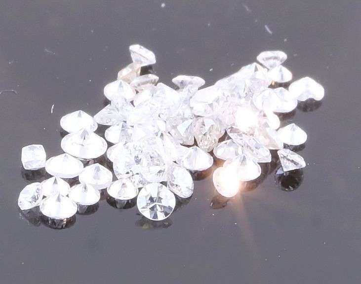 Bright white and full of fire! .86ct set of real Diamonds!