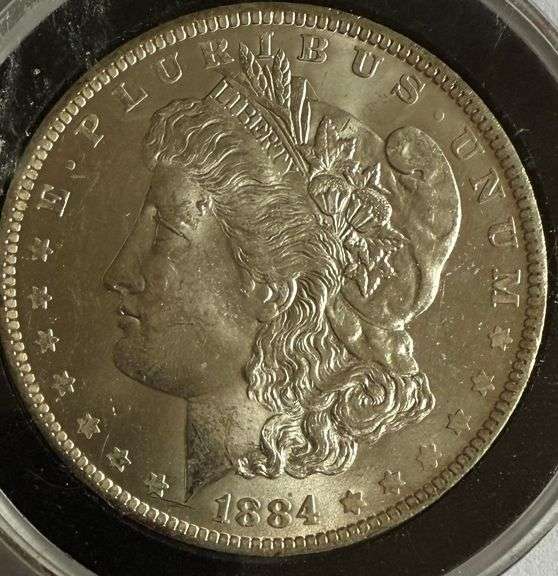 Frosty White BU 1884 O Morgan Dollar.