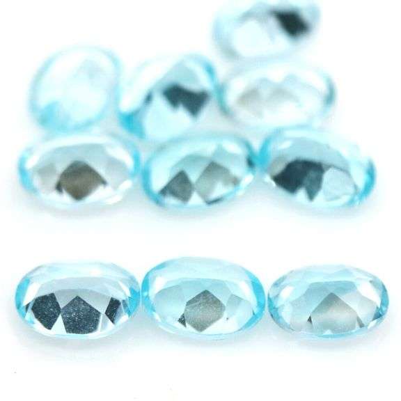 Bright 14.24ct matched sky blue Topaz set